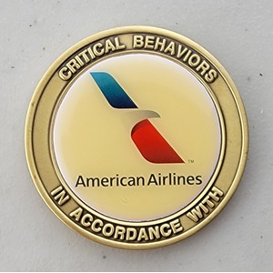 Custom Business Challenge Coin for AMERICAN AIRLINES - CRITICAL BEHAVIORS, side 1. Features and context: Business Challenge Coin, Corporate Coin, Corporation.