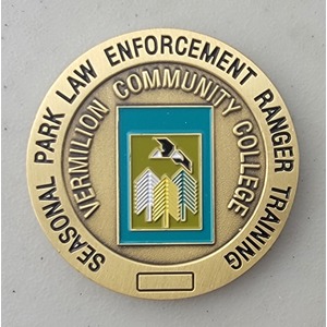 Custom College Challenge Coin for VERMILLION COMMUNITY COLLEGE, side 1. Features and context: College Challenge Coin, College.
